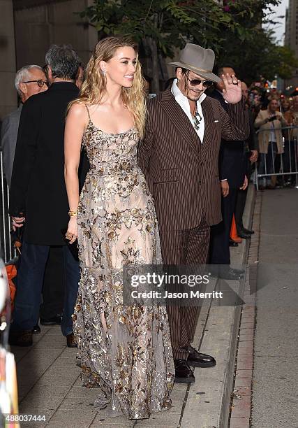 Actress Amber Heard and actor Johnny Depp attend 'The Danish Girl' premiere during the 2015 Toronto International Film Festival at the Princess of...