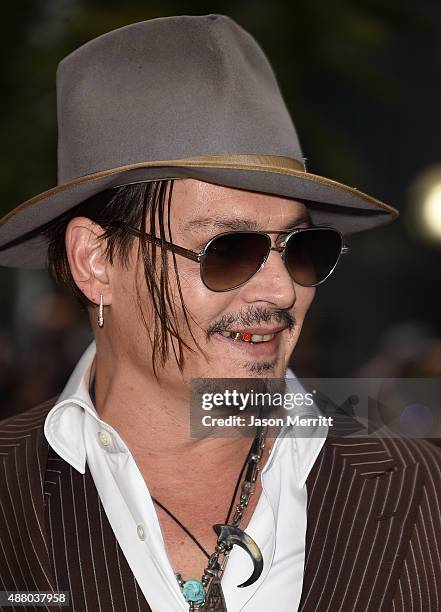 Actor Johnny Depp attends 'The Danish Girl' premiere during the 2015 Toronto International Film Festival at the Princess of Wales Theatre on...
