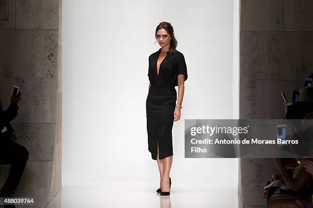 Designer Victoria Beckham walks the runway wearing Victoria Beckham Spring 2016 during New York Fashion Week at The Cunard Building on September 13,...