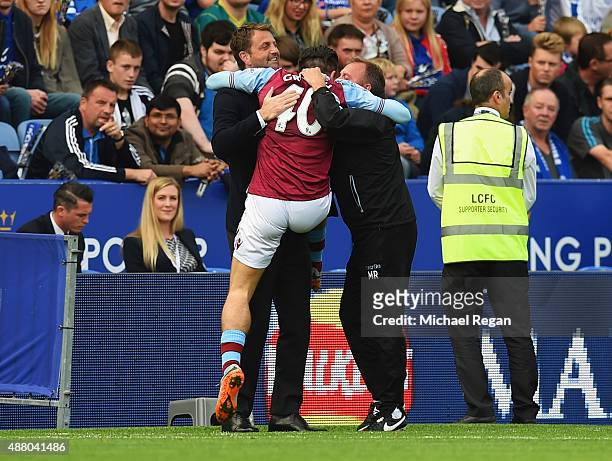 Jack Grealish of Aston Villa celebrates with Tim Sherwood manager of Aston Villa and coach Mark Robson as he scores their first goal during the...