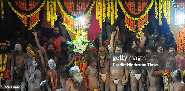 Sadhus of 10 akharas take bath on the auspicious day of Mauni Amavasya during the Maha Kumbh Mela at Trimbakeshwar, on September 13, 2015 in Nashik,...