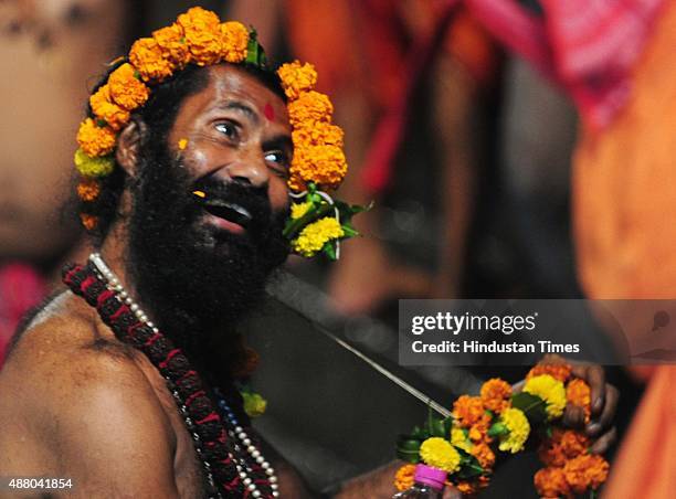 Sadhus of 10 akharas take bath on the auspicious day of Mauni Amavasya during the Maha Kumbh Mela at Trimbakeshwar, on September 13, 2015 in Nashik,...