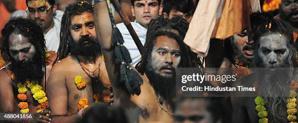 Sadhus of 10 akharas take bath on the auspicious day of Mauni Amavasya during the Maha Kumbh Mela at Trimbakeshwar, on September 13, 2015 in Nashik,...