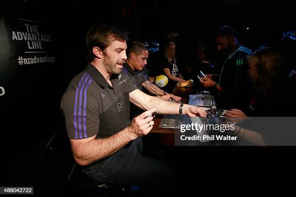 Conrad Smith of the New Zealand All Blacks during a signing session with fans at Rileys Sports Bar on September 13, 2015 in London, England.