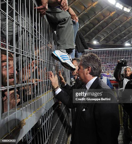 Daniele Pradè sprts director of Fiorentina speaks with fans of Fiorentina before the TIM Cup final match between ACF Fiorentina and SSC Napoli at...