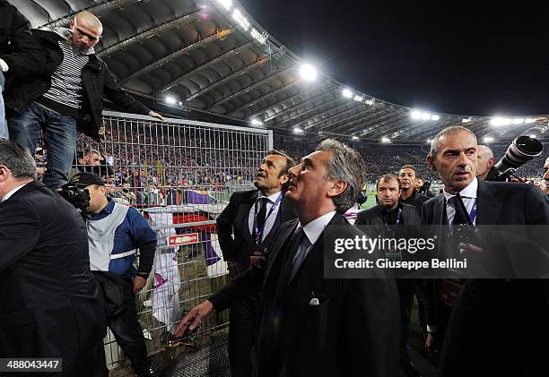 Daniele Pradè sprts director of Fiorentina speaks with fans of Fiorentina before the TIM Cup final match between ACF Fiorentina and SSC Napoli at...