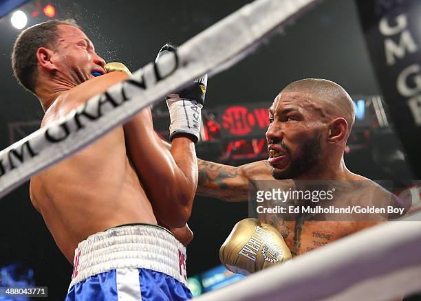 Ashley Theophane lands a right hand to the head of Angino Perez during their welterweight fight at the MGM Grand Garden Arena on May 3, 2014 in Las...
