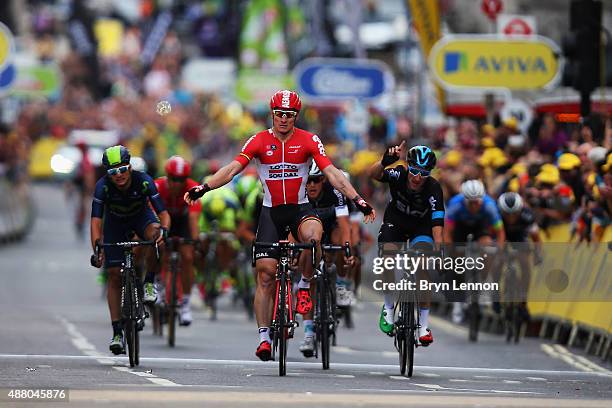 Andre Greipel of Germany and Lotto-Soudal claims victory on the finish line of stage eight of the Tour of Britain, an 86.8km stage around central...