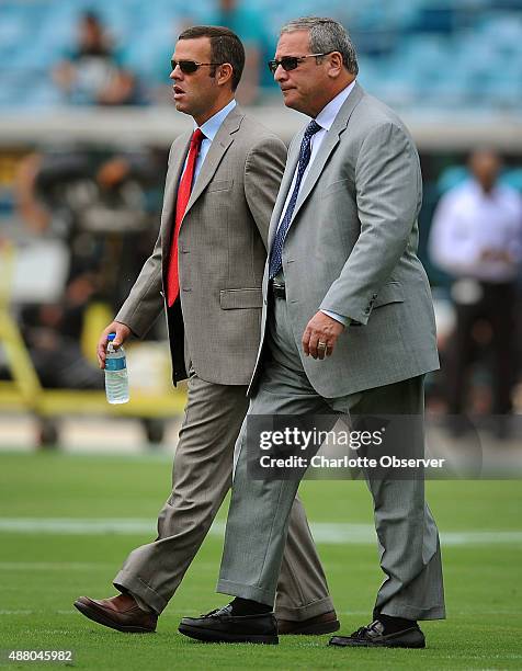 Carolina Panthers assistant general manager Brandon Beane and general manager Dave Gettleman prior to a game against the Jacksonville Jaguars at...