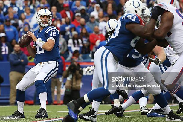 Andrew Luck of the Indianapolis Colts looks to throw against the Buffalo Bills during the first half at Ralph Wilson Stadium on September 13, 2015 in...