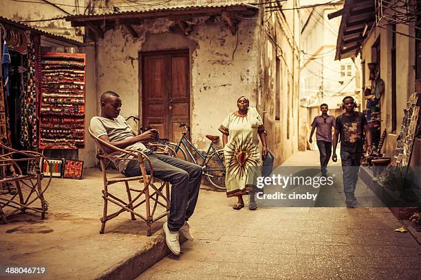 in the alley´s of stone town - zanzibar - black alley stock pictures, royalty-free photos & images