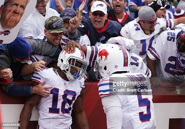 Percy Harvin of the Buffalo Bills celebrates his touchdown with Tyrod Taylor of the Buffalo Bills against the Indianapolis Colts during the first...