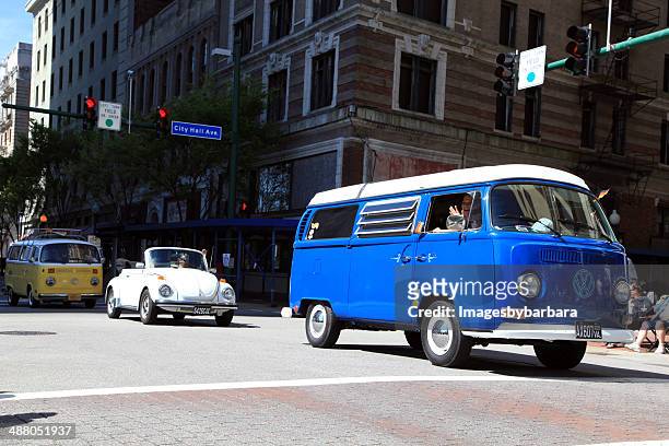 parade of volkswagen - car parade stock pictures, royalty-free photos & images