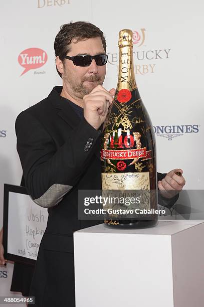 Phil Hellmuth toasts with Moet & Chandon at the 140th Kentucky Derby at Churchill Downs on May 3, 2014 in Louisville, Kentucky.