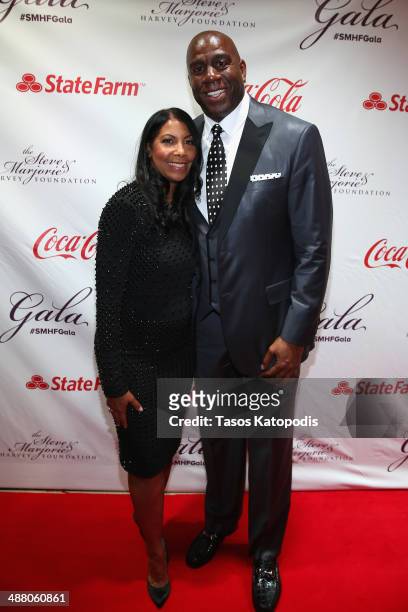Cookie Johnson and NBA Hall of Famer Magic Johnson attend the 2014 Steve & Marjorie Harvey Foundation Gala presented by Coca-Cola at the Hilton...