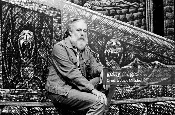 Artist and Writer Edward Gorey photographed in September 1977 on the set he designed for the Broadway production of Dracula, for which he won a Tony...