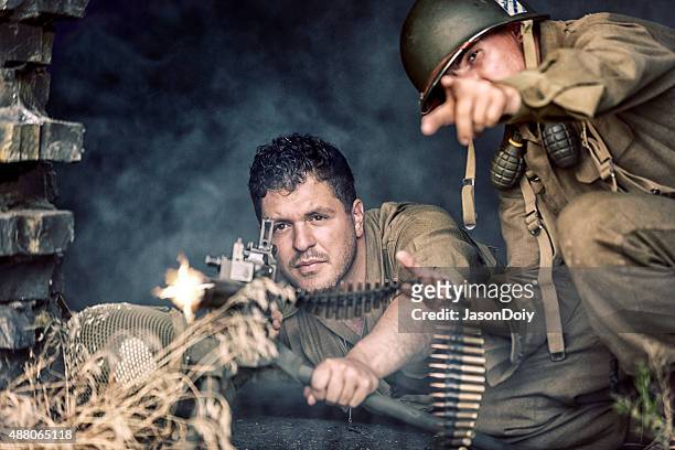 world war ii us army soldier firing a 50 caliber - hand grenade stock pictures, royalty-free photos & images