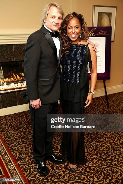 Clint Culpepper and Marjorie Harvey attend the 2014 Steve & Marjorie Harvey Foundation Gala presented by Coca-Cola VIP Reception at the Hilton...