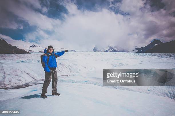 traveller at perito moreno glacier, patagonia, argentina - santa cruz province argentina stock pictures, royalty-free photos & images