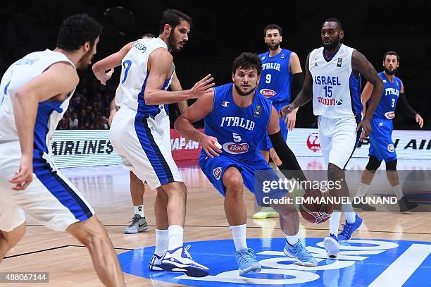 Italy's small forward Alessandro Gentile dribbles during the round of 16 basketball match between Israel and Italy at the EuroBasket 2015 in Lille,...