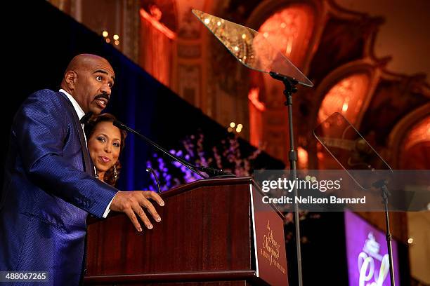 Steve and Marjorie Harvey speak on stage at the 2014 Steve & Marjorie Harvey Foundation Gala presented by Coca-Cola at the Hilton Chicago on May 3,...