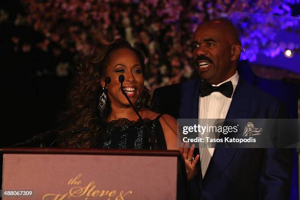 Marjorie and Steve Harvey speak onstage at the 2014 Steve & Marjorie Harvey Foundation Gala presented by Coca-Cola at the Hilton Chicago on May 3,...