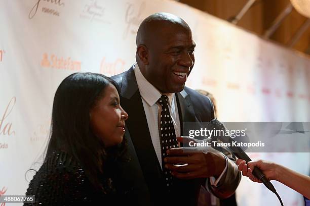 Philanthropist Cookie Johnson and NBA Hall of Famer Magic Johnson attend the 2014 Steve & Marjorie Harvey Foundation Gala presented by Coca-Cola at...