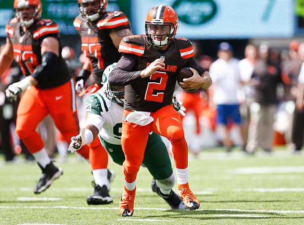 Johnny Manziel of the Cleveland Browns scrambles against the New York Jets during the game at MetLife Stadium on September 13, 2015 in East...