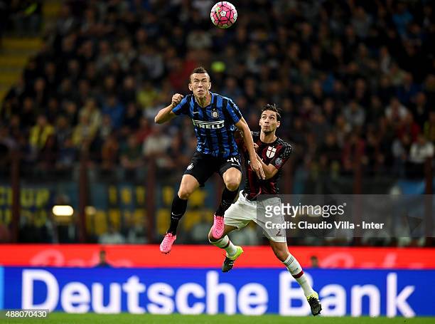 Ivan Perisic of FC Internazionale and Mattia De Sciglio of AC Milan compete for the ball during the Serie A match between FC Internazionale Milano...