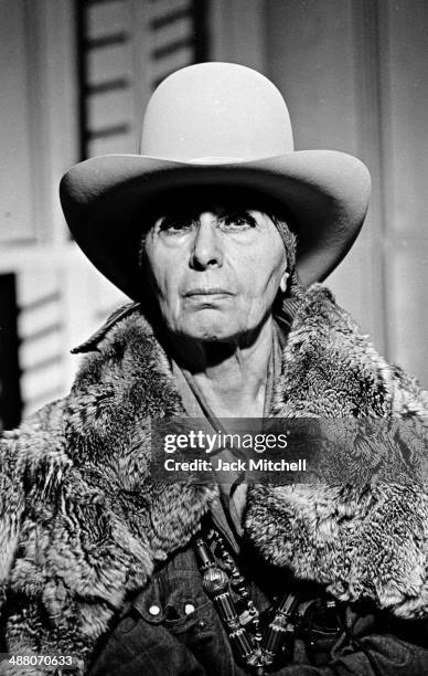 Sculptor Louise Nevelson photographed in her New York City studio in 1974.