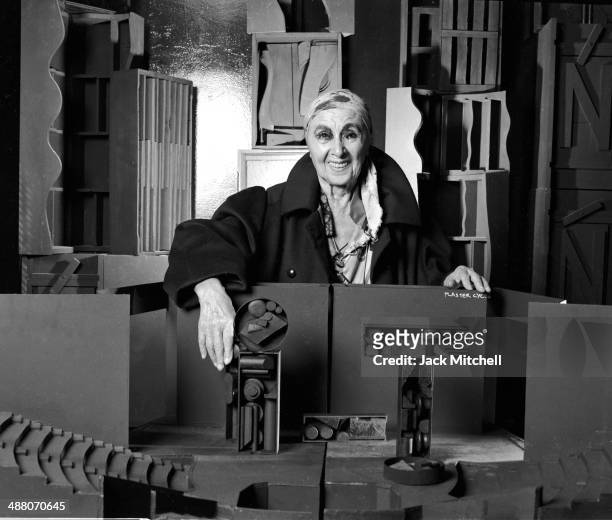 Sculptor Louise Nevelson photographed in her New York City studio in 1983.