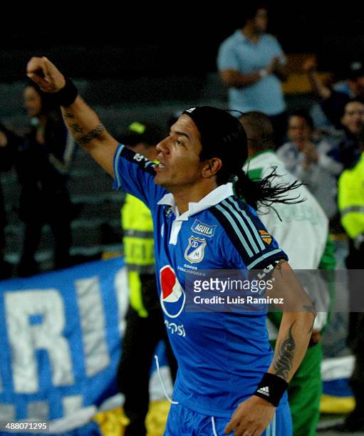 Dayro Moreno player of Millonarios FC celebrates after scoring the first goal of the game during a match between Millonarios FC and La Equidad as...