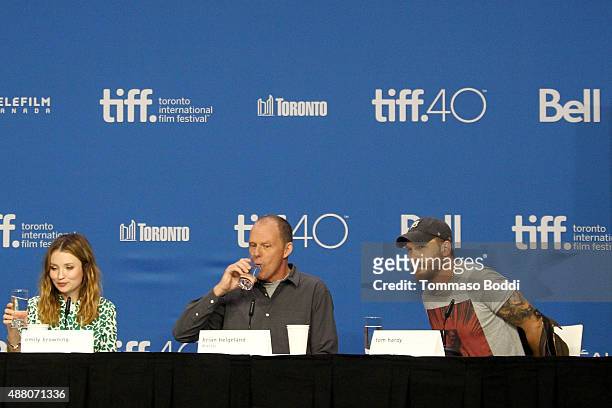 Actress Emily Browning, writer/director Brian Helgeland and actor Tom Hardy speak onstage during the "Legend" press conference at the 2015 Toronto...