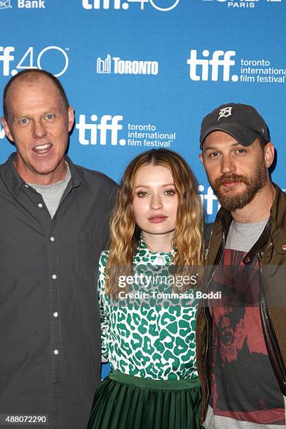 Writer/director Brian Helgeland, actress Emily Browning and actor Tom Hardy pose during the "Legend" press conference at the 2015 Toronto...