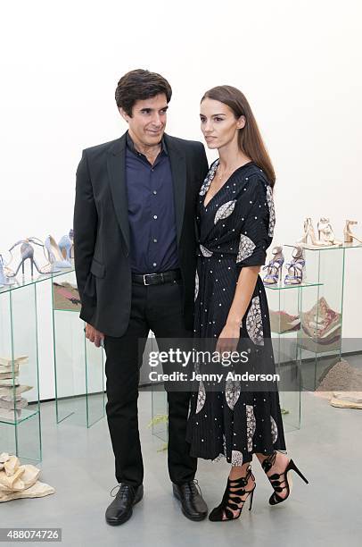 Designer Chloe Gosselin and husband David Copperfield attend her Spring 2016 New York Fashion Week presentation at Lori Bookstein Fine Art on...