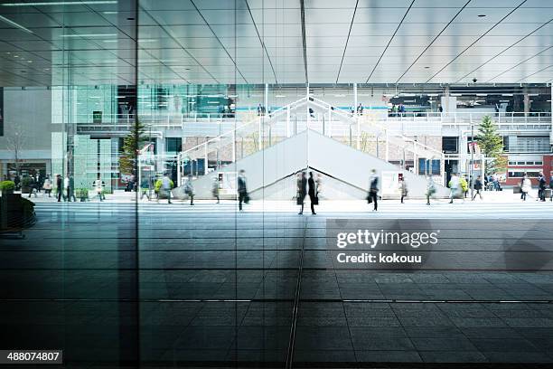 lot of people come and go - city lights reflected on buildings speed stock pictures, royalty-free photos & images