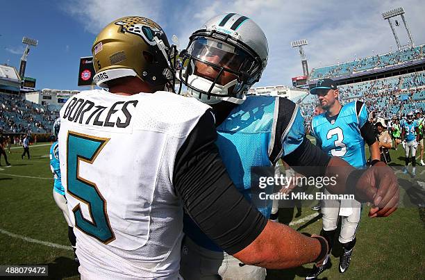 Cam Newton of the Carolina Panthers and Blake Bortles of the Jacksonville Jaguars shake hands during a game at EverBank Field on September 13, 2015...