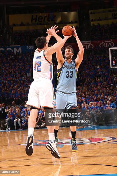 Marc Gasol of the Memphis Grizzlies shoots against the Oklahoma City Thunder in Game Seven of the Western Conference Quarterfinals during the 2014...