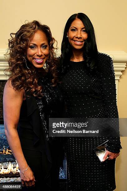 Majorie Harvey and Cookie Johnson attend the 2014 Steve & Marjorie Harvey Foundation Gala presented by Coca-Cola VIP Reception at the Hilton Chicago...