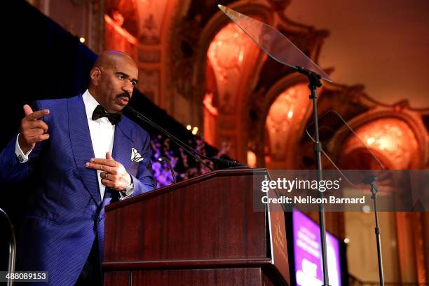 Steve Harvey speaks on stage at the 2014 Steve & Marjorie Harvey Foundation Gala presented by Coca-Cola at the Hilton Chicago on May 3, 2014 in...