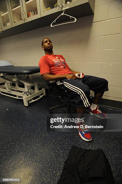 Chris Paul of the Los Angeles Clippers looks on in the locker room before facing the Golden State Warriors in Game Seven of the Western Conference...