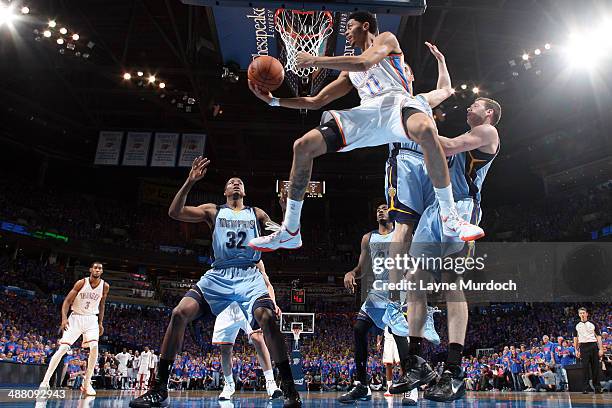 Jeremy Lamb of the Oklahoma City Thunder shoots against the Memphis Grizzlies in Game Seven of the Western Conference Quarterfinals during the 2014...