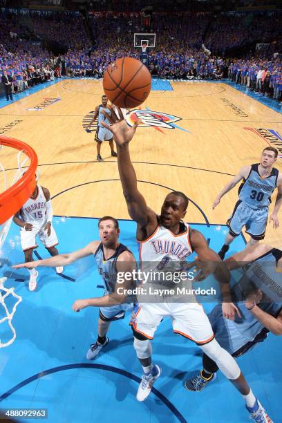 Serge Ibaka of the Oklahoma City Thunder shoots against the Memphis Grizzlies in Game Seven of the Western Conference Quarterfinals during the 2014...