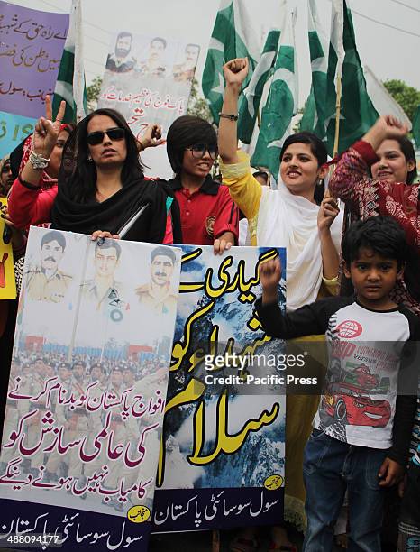 Pakistani Activists of civil society, rally to support Pakistan's army in Lahore, Pakistan. Pakistani army filed a complaint against the countrys...