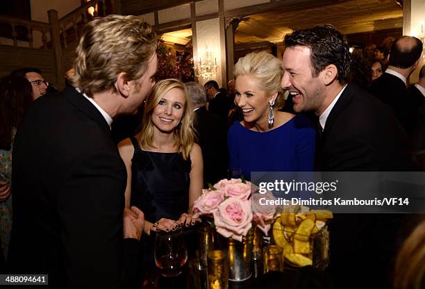 Dax Shepard, Kristen Bell, Candice Crawford and Tony Romo attend the Bloomberg & Vanity Fair cocktail reception following the 2014 WHCA Dinner at...