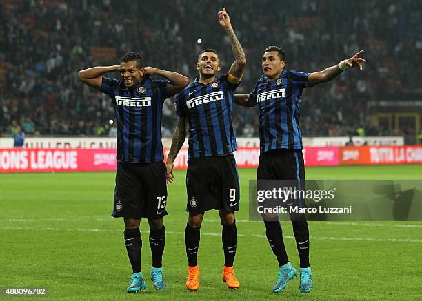 Vasquez Fredy Alejandro Guarin, Mauro Emanuel Icardi and Jeison Murillo celebrate a victory at the end of the Serie A match between FC Internazionale...