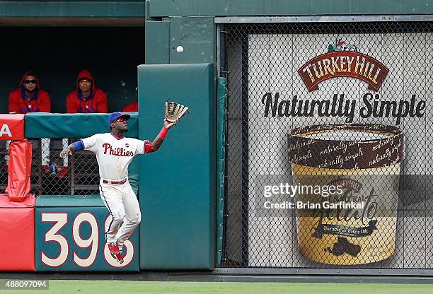 Odubel Herrera of the Philadelphia Phillies catches a long fly ball hit by Kyle Schwarber of the Chicago Cubs in the fifth inning of the game at...