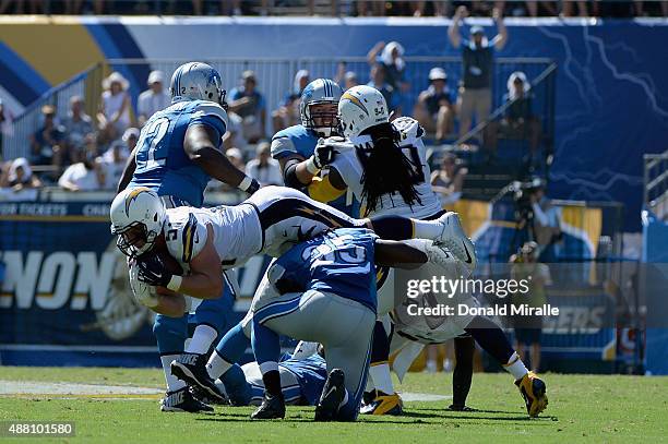 Linebacker Kyle Emanuel of the San Diego Chargers intercepts a pass attempt by quarterback Matthew Stafford of the Detroit Lions at Qualcomm Stadium...