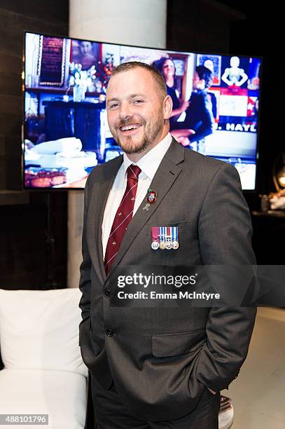 Cpl Paul 'Tug' Hartley of 'Kilo Two Bravo' attends the Guess Portrait Studio at the Toronto International Film Festival on September 13, 2015 in...