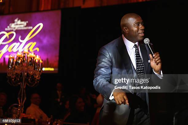 Magic Johnson speaks at the 2014 Steve & Marjorie Harvey Foundation Gala presented by Coca-Cola at the Hilton Chicago on May 3, 2014 in Chicago,...